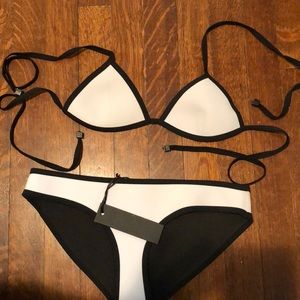 White Triangl bikini. Bottoms are new with tag.